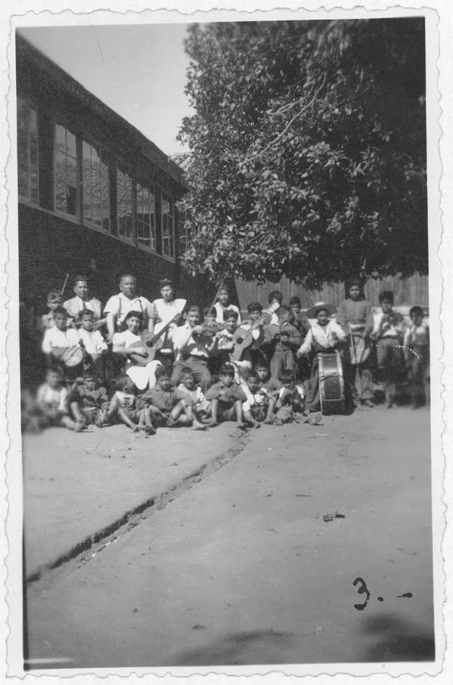 Orquesta de niños y profesores