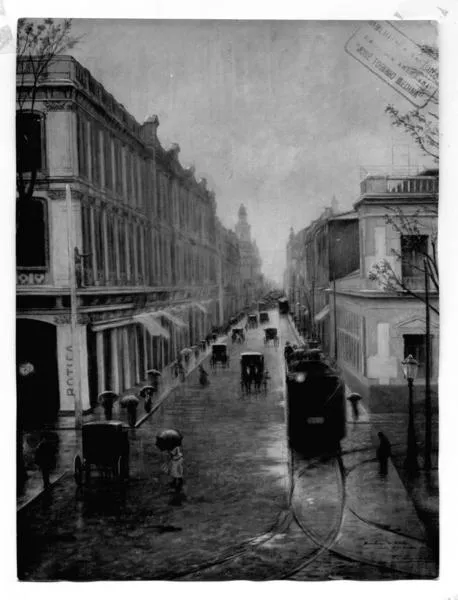 [Calle Ahumada, se divisa un tranvía y gente en un día de lluvía]  [fotografía].