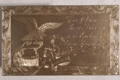 Placa conmemorativa de los obreros de la Braden a Arturo Alessandri