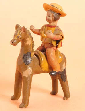 Huaso a caballo con cacho con chicha