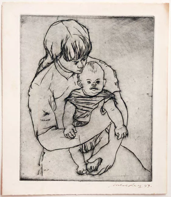 Madre sentada con niño