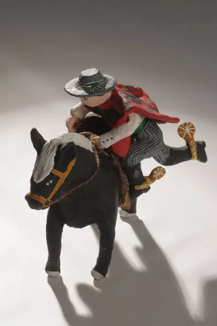 Huaso montando a caballo