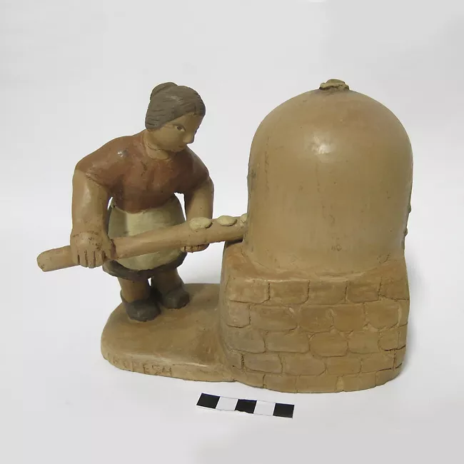 Mujer horneando pan