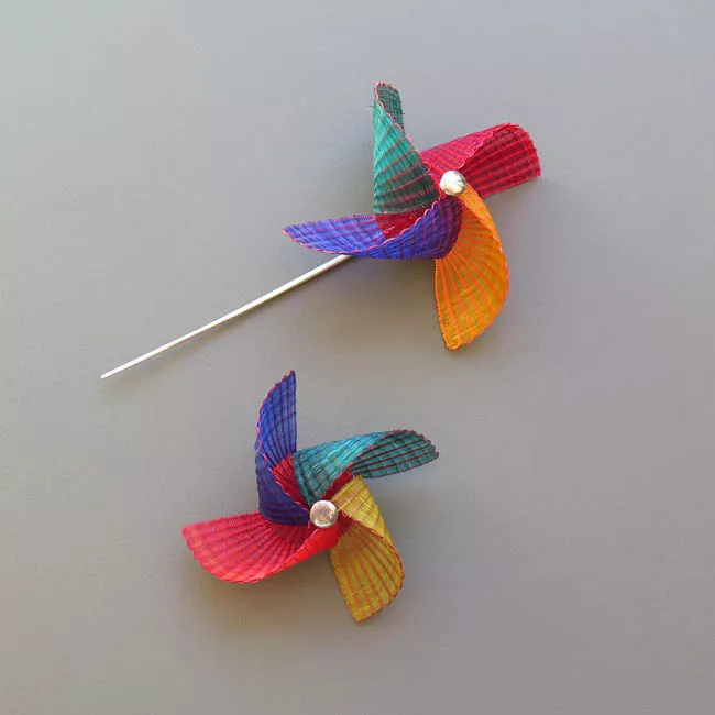 Remolino Tupu y Broche
