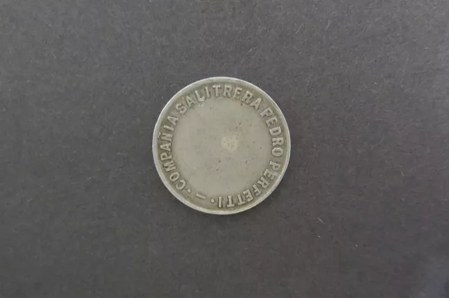Ficha Salitrera $1