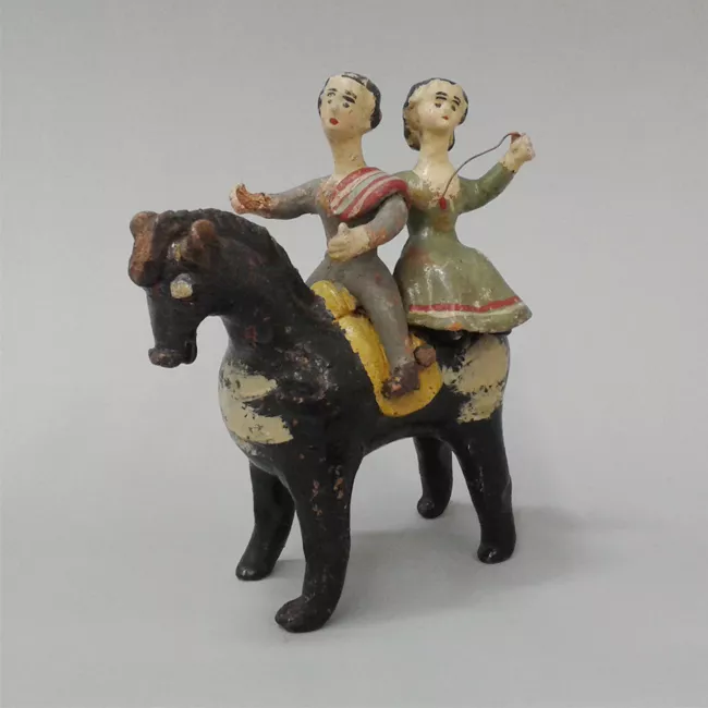 Pareja a caballo 