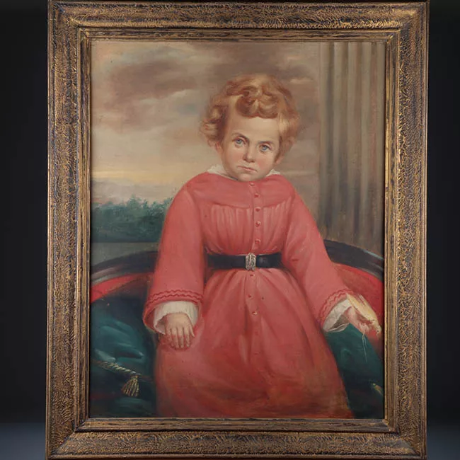 Retrato de niño con traje rojo