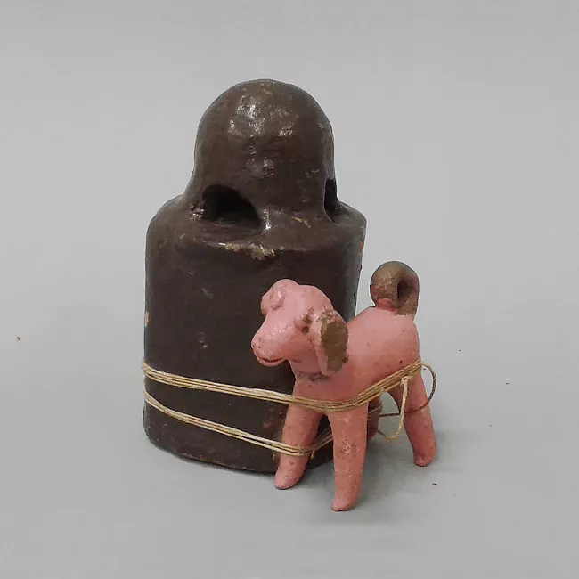 Perro junto horno