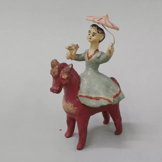 Mujer a caballo